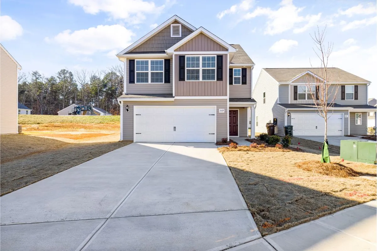 concrete driveway and house